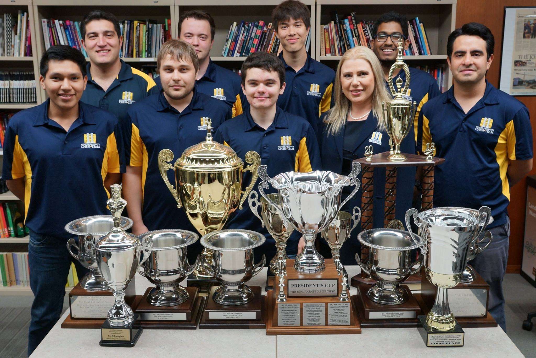 GM Priyadharshan Kannappan founder of Chess Gaja with his Webster University Teammates and coach GM Susan Polgar with the trophies won by the team