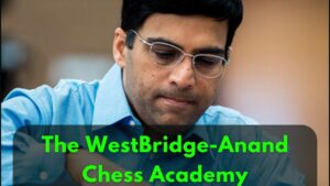 A person playing chess with the text "The WestBridge-Anand Chess Academy: Nurturing India’s Future Chess Masters" overlaid on the image.