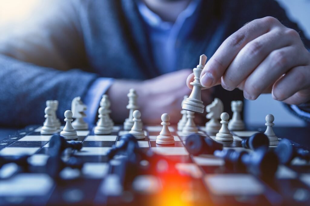 Chess player making a move on a board, representing common decision-making mistakes in the London System
